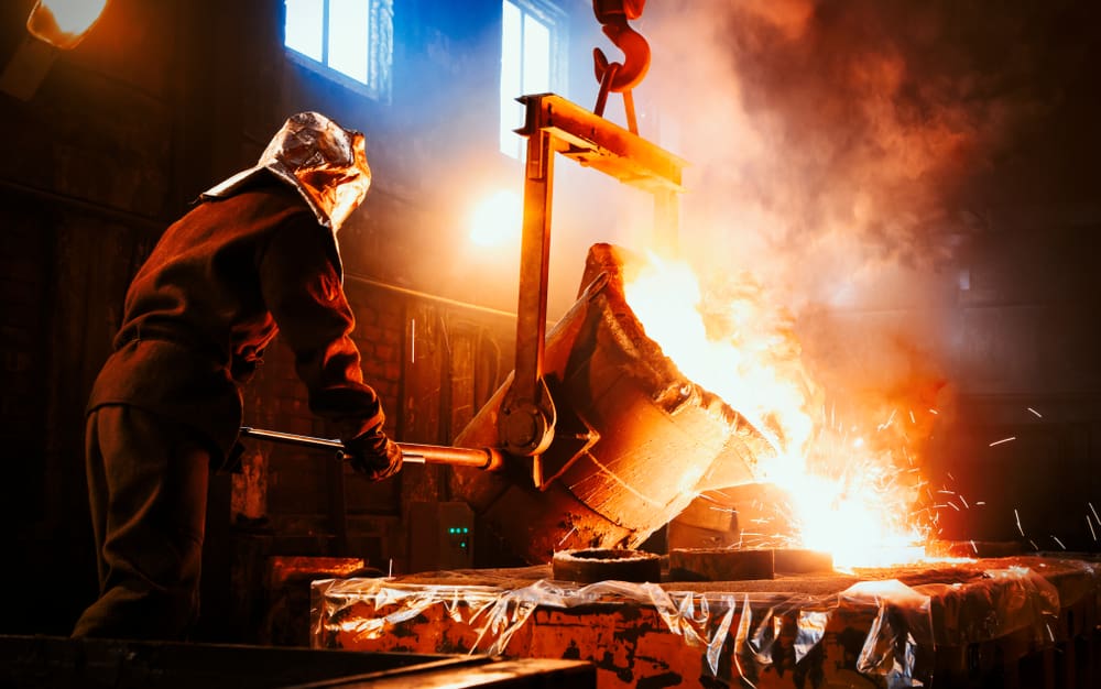 Workers,Operates,At,The,Metallurgical,Plant.,The,Liquid,Metal,Is