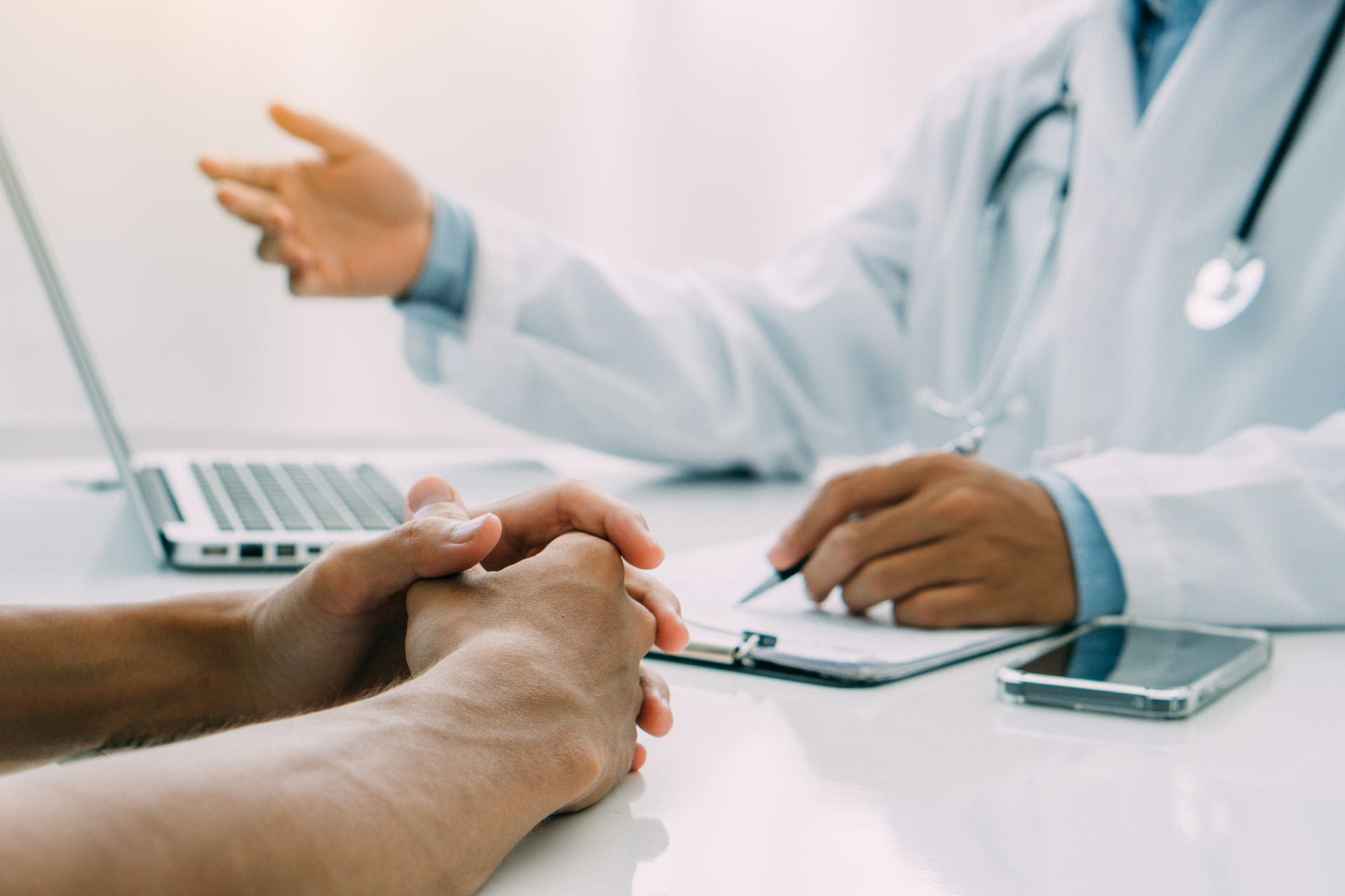 doctor-and-patient-are-discussing-consultation Workers' compensation lawyer